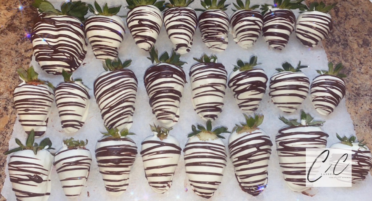 Chocolate dipped strawberries with white drizzle by Lashea Creative Studio