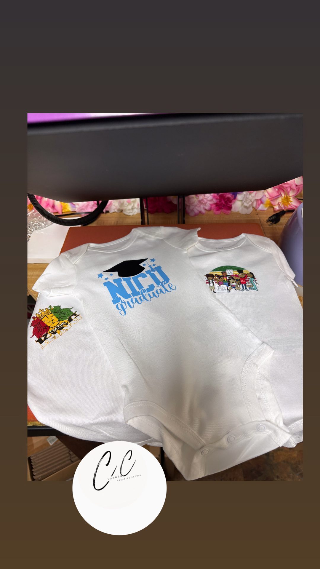 Custom printed baby onesie set including NICU Graduate design